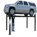 Atlas Garage Pro8000, 8,000 lb 4 Post Vehicle Storage Lift - Semi Side View Lifting High