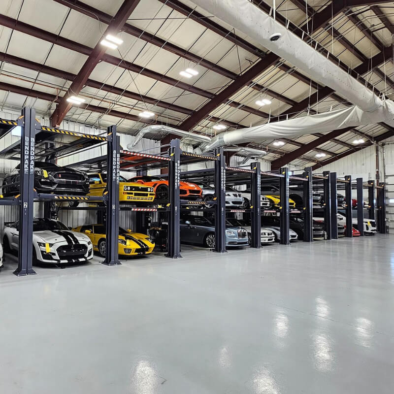 BendPak HD-973PX Tri-Level Vehicle Storage Lift Extra Long - Lift with Cars in  Line View