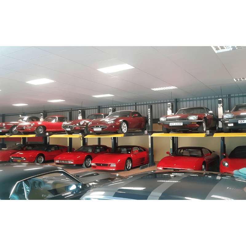 BendPak PL6000DC 6,000lb Vehicle Storage Lift - Narrow Front View All Red Cars
