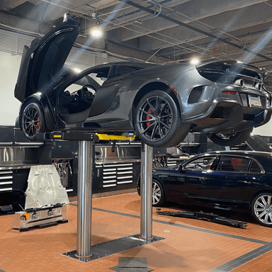 EV1020 Series 10K Standard Inground Lift Side View with Sports Car Lifting