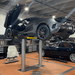 EV1020 Series 10K Standard Inground Lift Side View with Sports Car Lifting