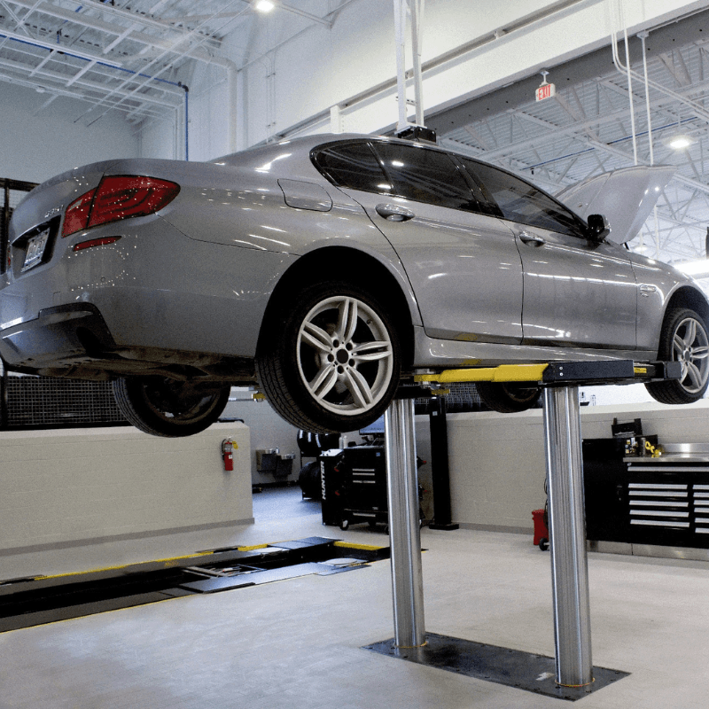 Challenger EV1020 Series 10K Standard Inground Lift With Car Lifting View