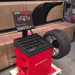 Olympic W820 Direct Drive Wheel Balancer Side View with Wheel