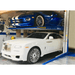 Omer BIPARK 26 Double Car Stacker Hydraulic Parking Lift Side View with 2 Luxury Cars
