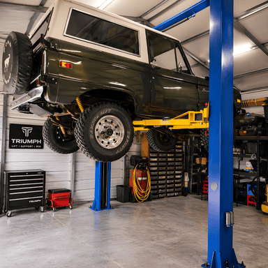TP9KACX 9,000lb 2 Post Car Lift Clear Floor - Asymmetric Side View with Car Lifting